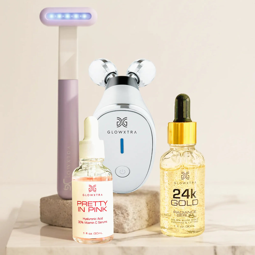 GlowXtra complete glow set with microcurrent roller, LED wand, Vitamin C serum, and 24K Gold serum.
