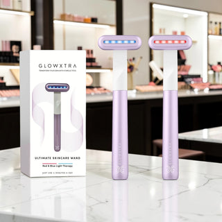 Glowxtra skincare wand with packaging on a counter