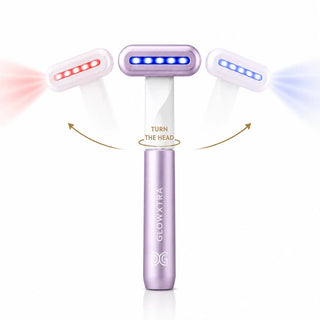 A handheld beauty device shown on a white background with two heads floating above, one emitting red light and the other emitting blue light. The main device is lavender purple with LED light bars on the head and the brand name GLOWXTRA printed vertically on the handle.