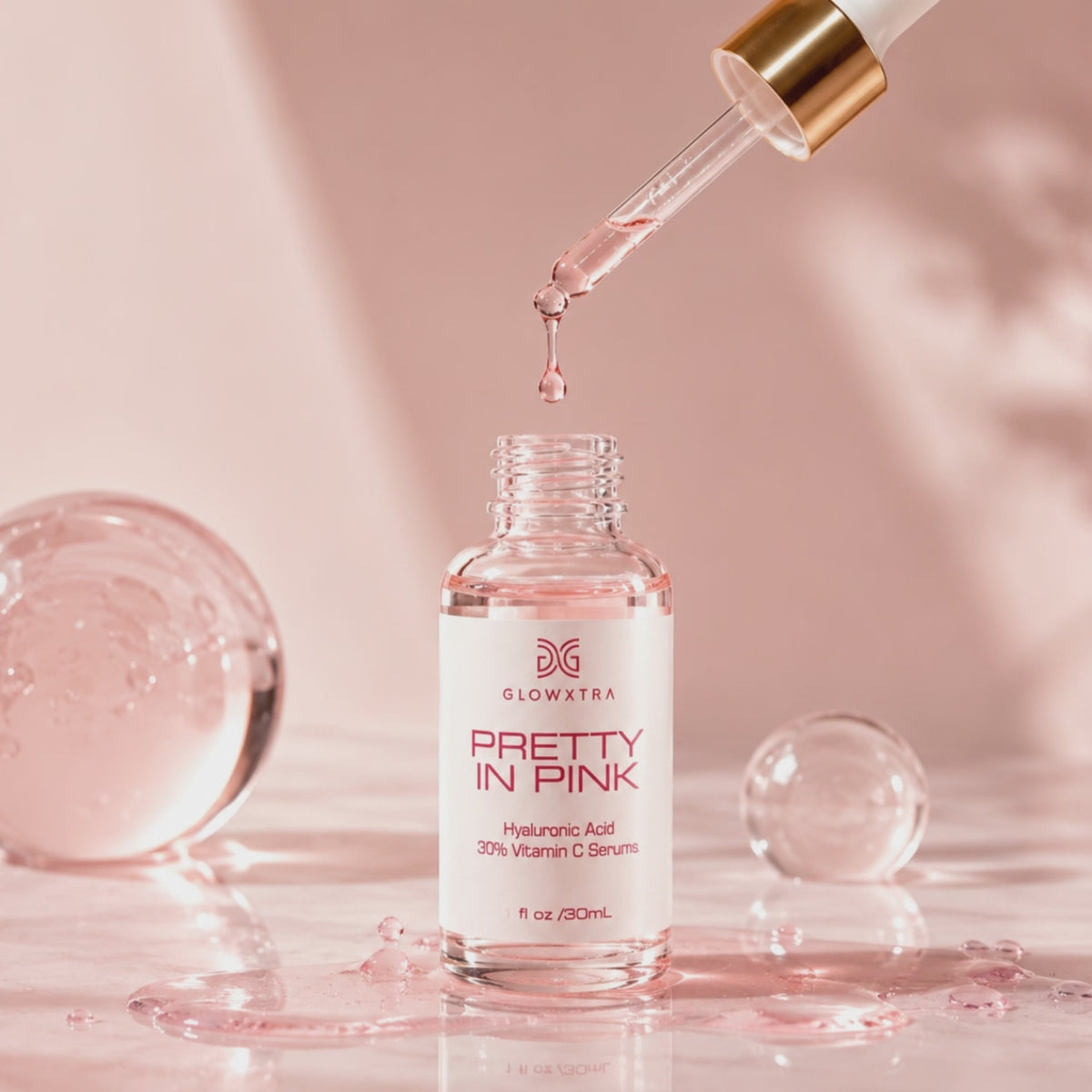 GlowXtra Pretty in Pink Serum with silky pink droplets and luminous skincare textures.”